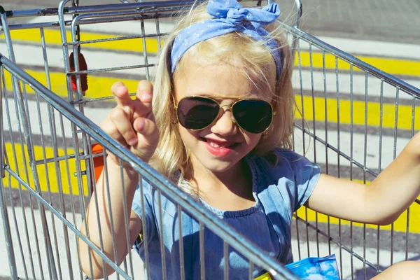 Little Stylish Female Child Sunglasses Having Fun Shopping Cart — Stock Photo, Image