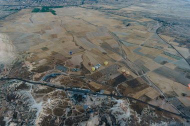 aerial view of Hot air balloons festival in Goreme national park, fairy chimneys, Cappadocia, Turkey clipart