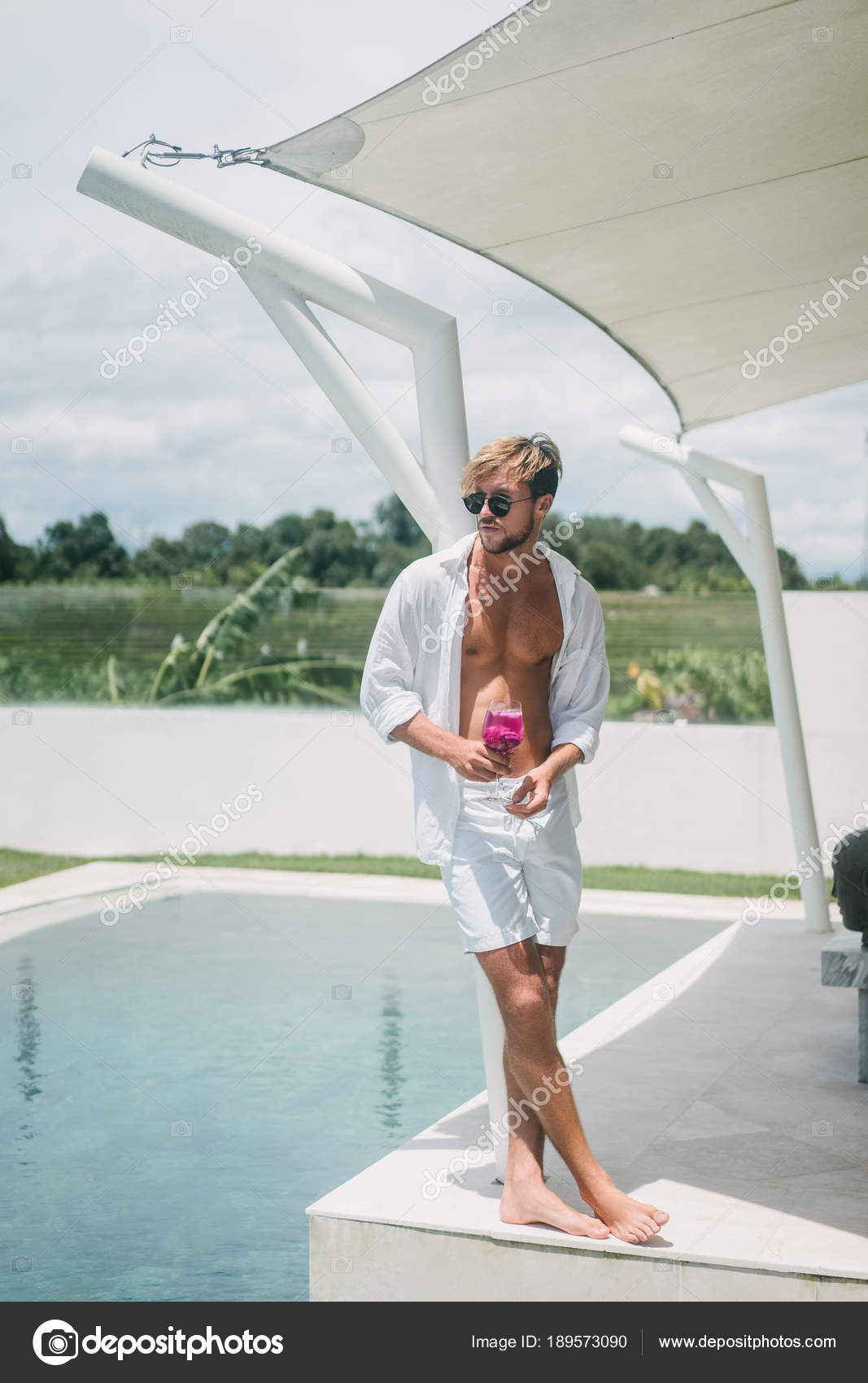 Poolside — Stock Photo © YuliyaKirayonakBO #189573090
