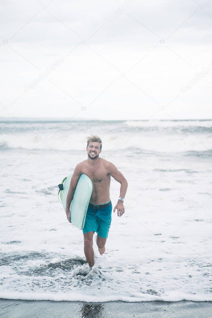 smiling surfer