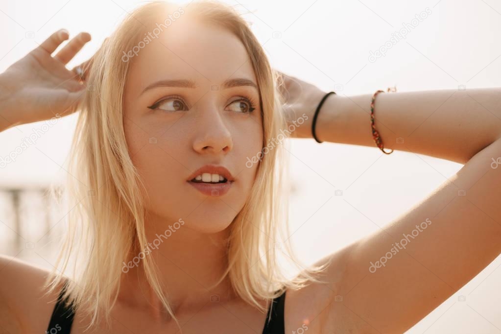 portrait of attractive girl looking away in sunbeams
