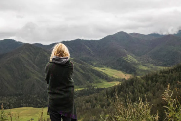 Woman in mountains — Stock Photo
