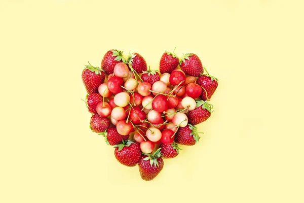 Strawberries on a yellow background — Stock Photo, Image