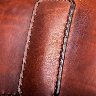 Bir evrak çantası üzerine dikiş ipi Close-Up