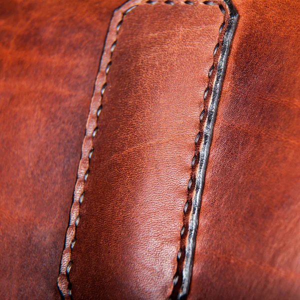 Bir evrak çantası üzerine dikiş ipi Close-Up