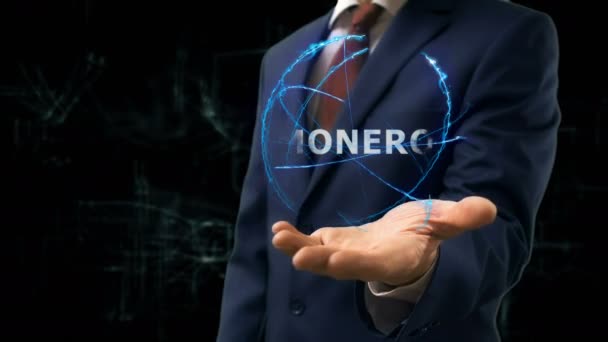 Επιχειρηματίας δείχνει έννοια ολόγραμμα Monero στο χέρι — Αρχείο Βίντεο