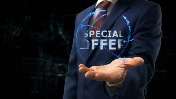 Empresario muestra holograma conceptual Oferta especial en su mano — Vídeo de stock