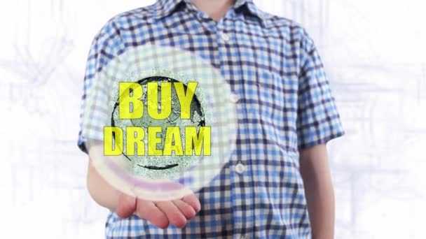 Młody człowiek pokazuje hologram planety ziemi i tekst Kupię marzenie — Wideo stockowe