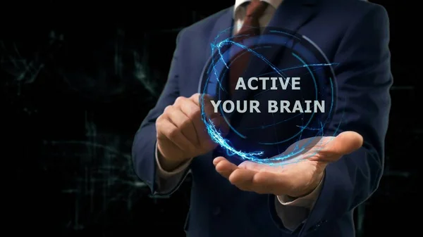 Biznesmen przedstawiono pojęcia hologramu Active mózgu na rękę — Zdjęcie stockowe