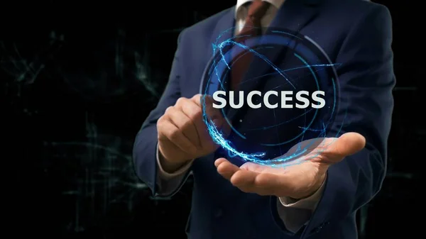 Бізнесмен показує концептуальну голограму Успіх на руці — стокове фото