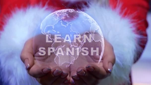 Hands holding planet with text Learn Spanish — Stock Video