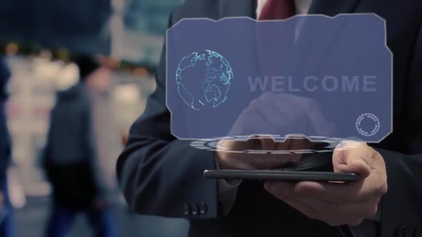 Businessman uses hologram Welcome — 图库视频影像