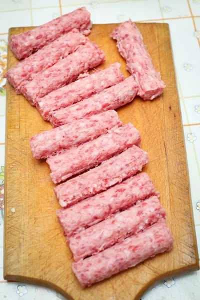 Raw meat rolls — Stock Photo, Image