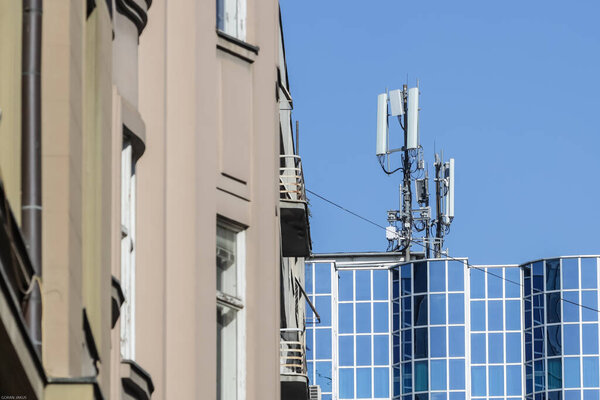 Zagreb, Croatia - April 15, 2020 : Cell sites on the roof of a apartment building in downtown of Zagreb, Croatia.