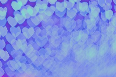 Mavi renkli kalp bokeh arka plan