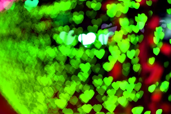 Zielone serce kolorowe tło bokeh — Zdjęcie stockowe