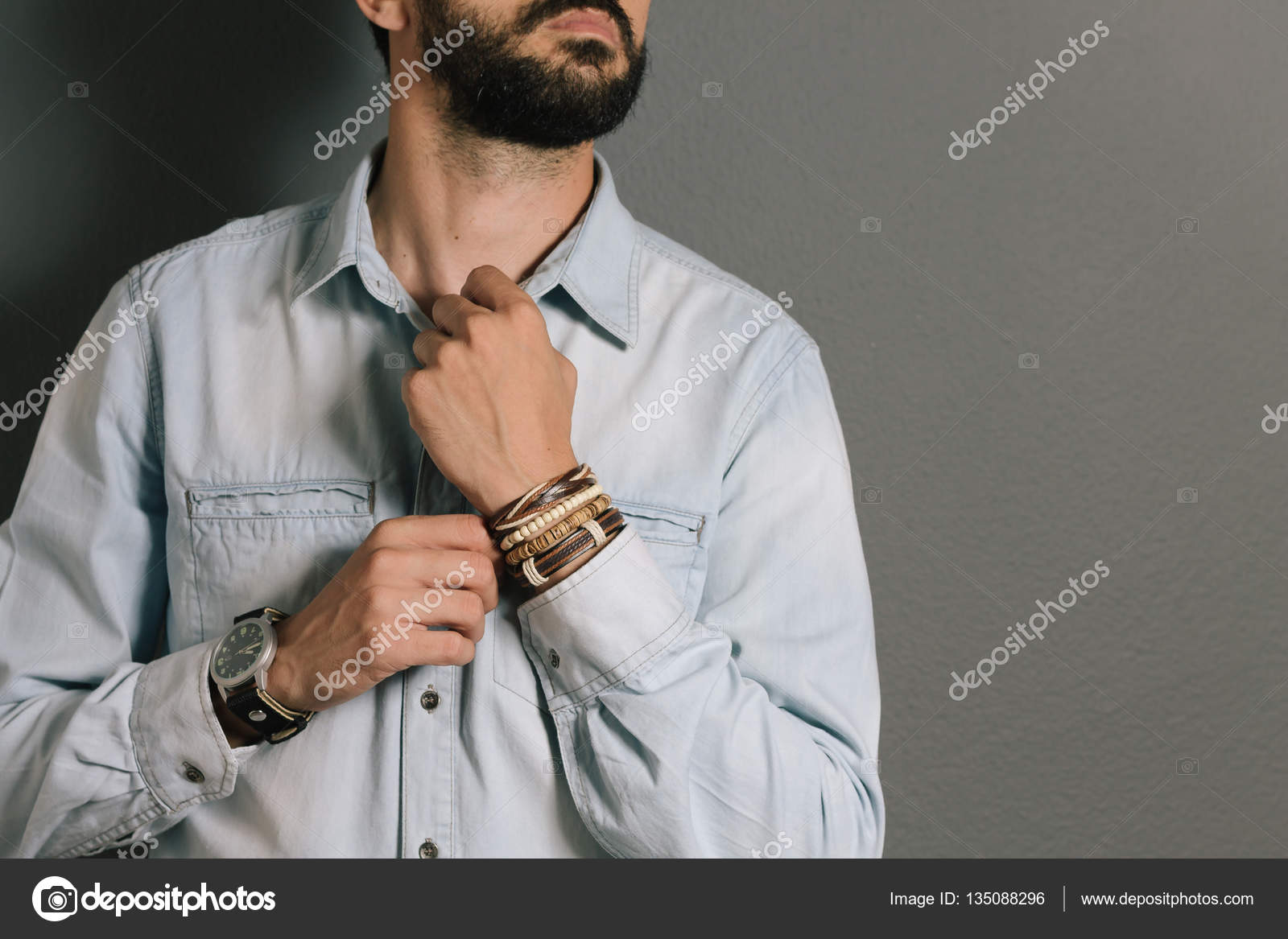 The Man In Jean Jacket Wearing Bracelets And Wristwatch, Casual Style Of Men  Accessories. Shallow Depth Of Field. Stock Photo, Picture and Royalty Free  Image. Image 104124538.