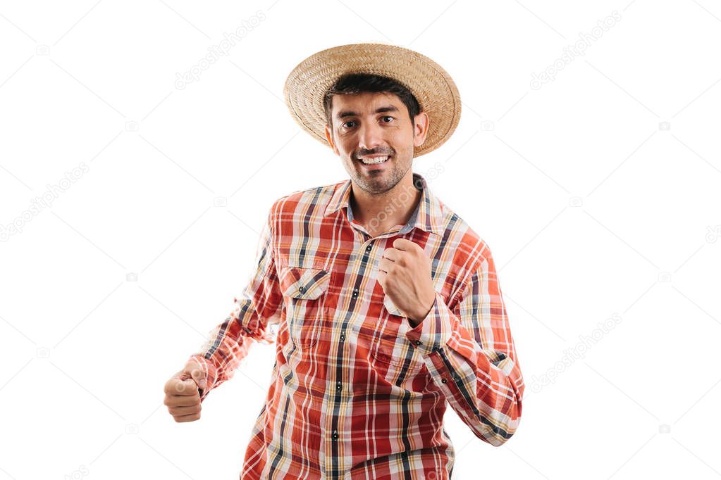 Portrait of brazilian man wearing typical clothes for the Festa Junina