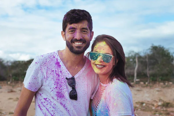 Portrait of happy couple in love on holi color festival — Stok Foto