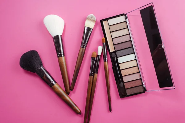 Set of colorful cosmetics on pink background — Stock Image Set of colorful cosmetics on pink background Stock Picture