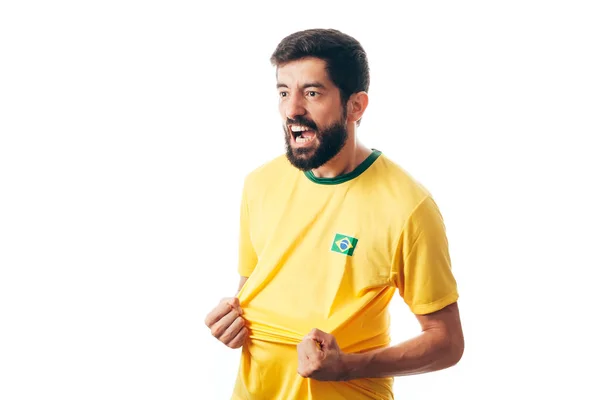 Brazilský fotbalista slaví na bílém pozadí — Stock fotografie