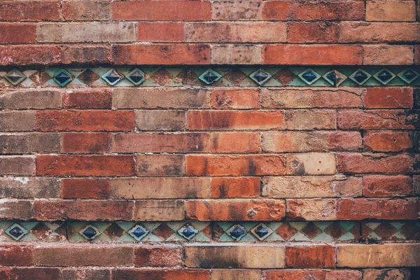 Aged Brick Wall Decorated Blue Tiles Background — Stock Photo, Image