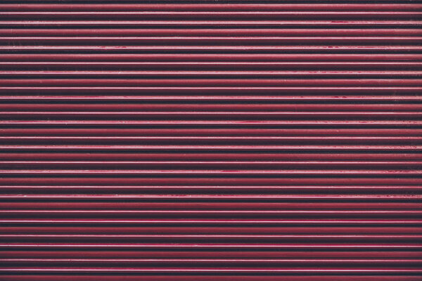 red horizontally striped wall for background