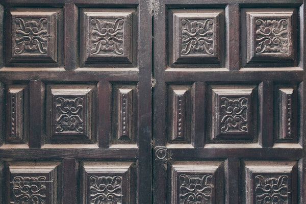 black doors decorated with arabesque pattern for background