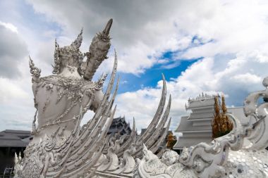 close-up shot of hindu sculpture at thai temple clipart