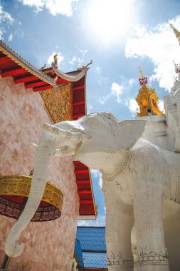 beautiful elephant sculpture at thai temple clipart