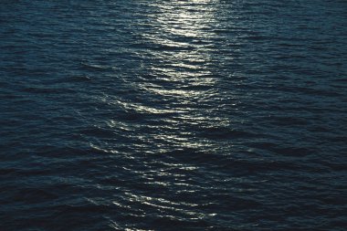 beautiful sea surface with moonlight reflection clipart