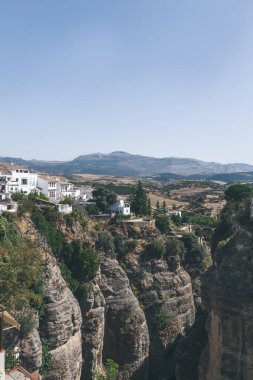 scenic view of buildings on rock, Ronda, spain clipart