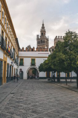 view of bell tower Giralda from square, spain clipart