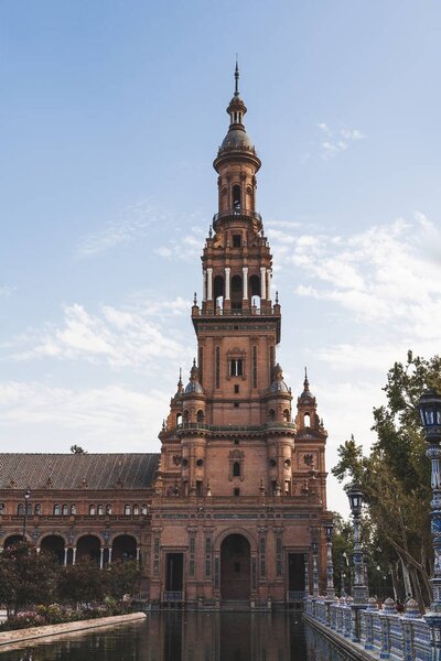 eclectic tower under blue sky, Seville, spain
