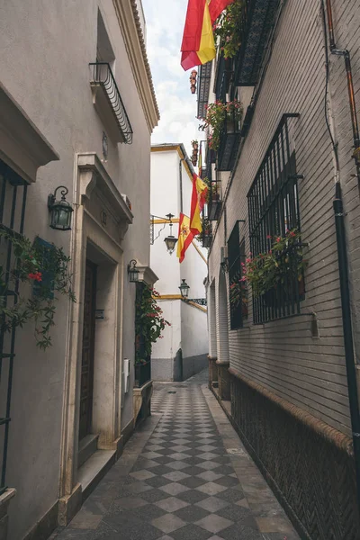 View Narrow Street Spanish Flags — Stock Photo, Image