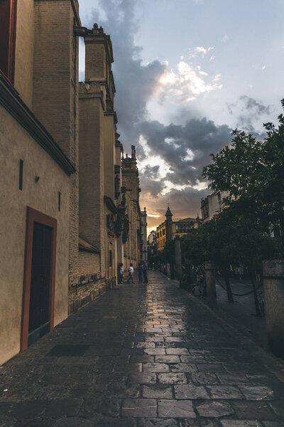 street view at evening time under beautiful cloudy sky, spain