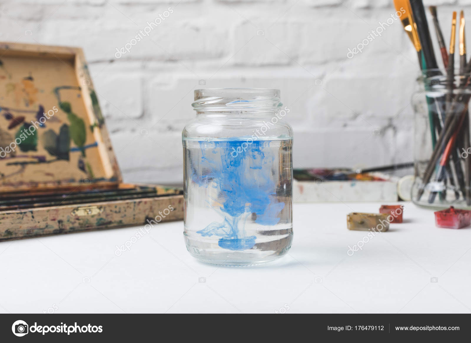 Close View Glass Jar Water Blue Paint Designer Workplace — Stock Photo