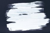 abstraktní malba s tahy štětce bílé na černém