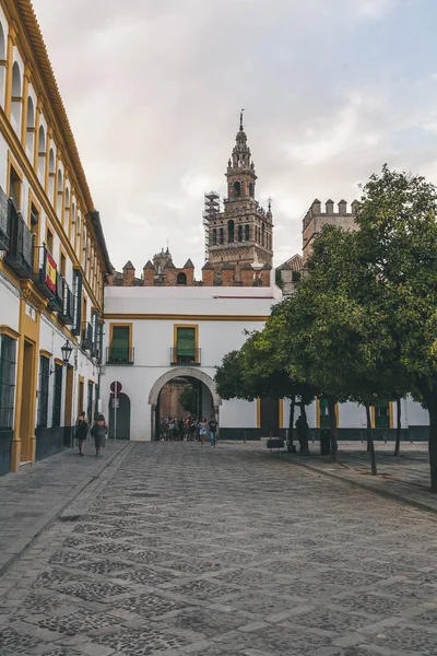 View of bell tower Giralda from square, spain — Stock Photo