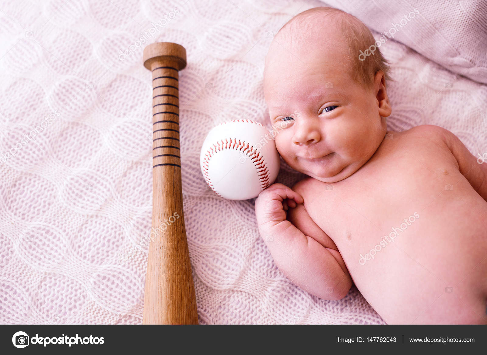 Funny Little Baby Boy with a Baseball Bat With Glove and Ball Stock