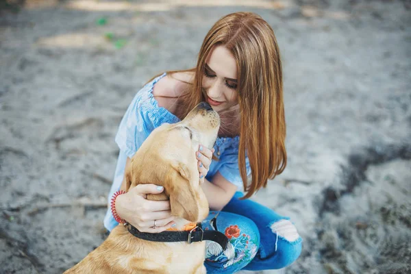Portrait of woman with dog — Stock Photo, Image