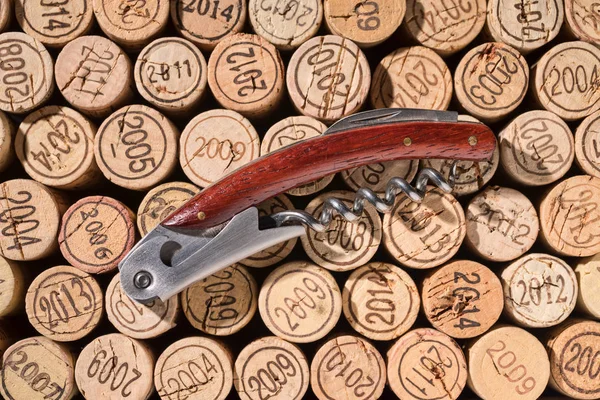 Elegant Corkscrew Lies Background Many Different Vintage Corks — Stock Photo, Image