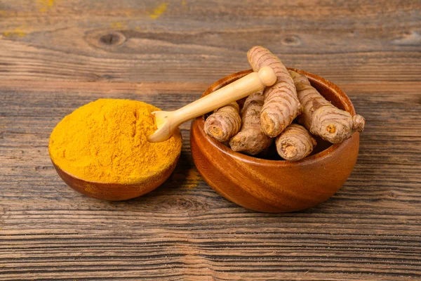 Fresh Whole Turmeric Roots Dried Curcuma Powder Wooden Bowl Front — Stock Photo, Image