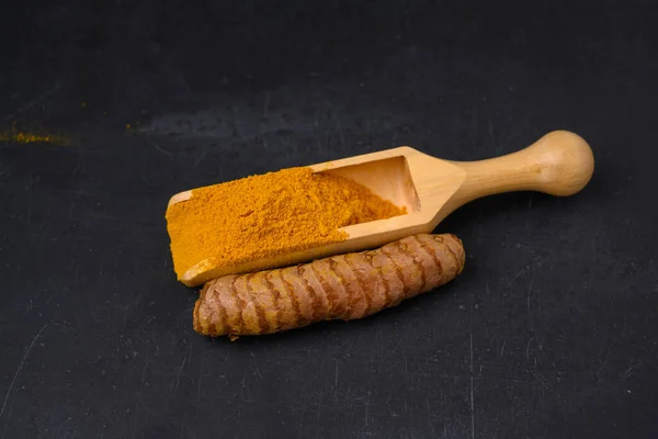 Wooden Spoon Dried Curcuma Powder Whole Fresh Turmeric Root Black — Stock Photo, Image