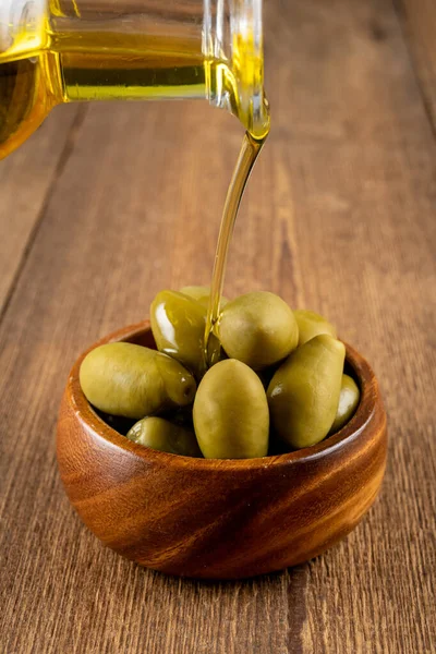 Olive Oil Poured Small Bottle Green Olives Wooden Bowl Set — Stock Photo, Image