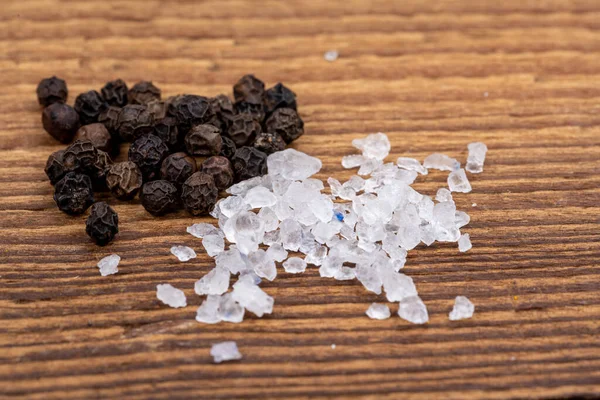 Close Coarse Crystal Salt Whole Black Peppercorns Rustic Wooden Background — Stock Photo, Image