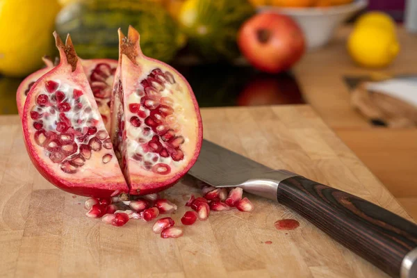 Close Two Half Pomegranates Fruits Damascus Kitchen Knife Wooden Cutting — Stock Photo, Image