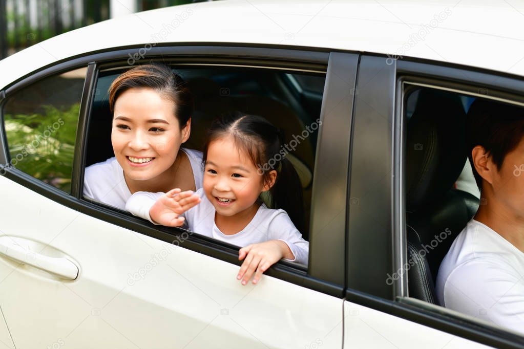Parents and Daughters are driving safely on a safe route.