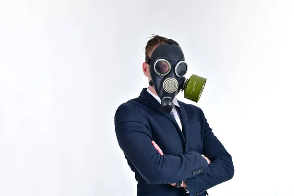 Business Concepts. Businessman wearing a gas mask on a white bac — Stock Photo, Image