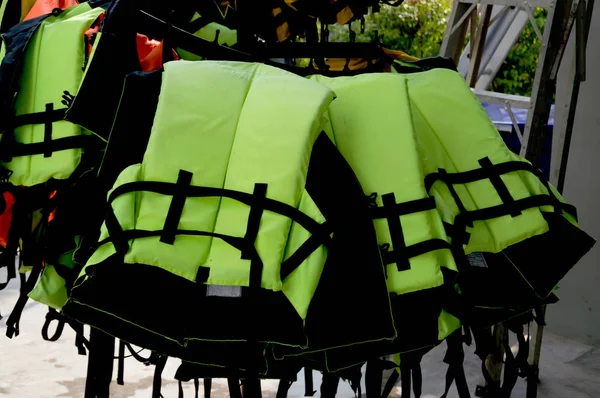 Life Jackets hanging on the clothes line. — Stock Photo, Image